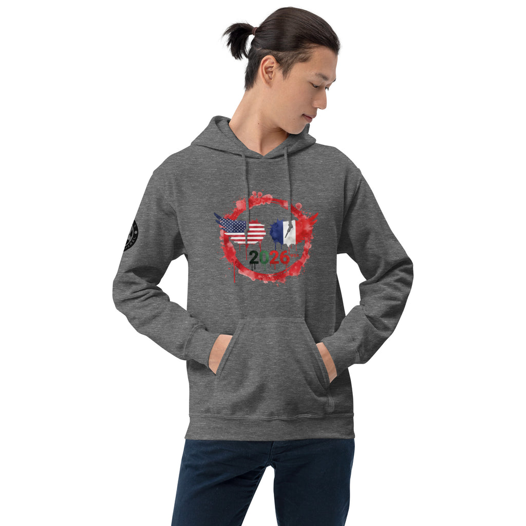 Person wearing a gray hoodie with a design of two flags and the number 2026 on a white background