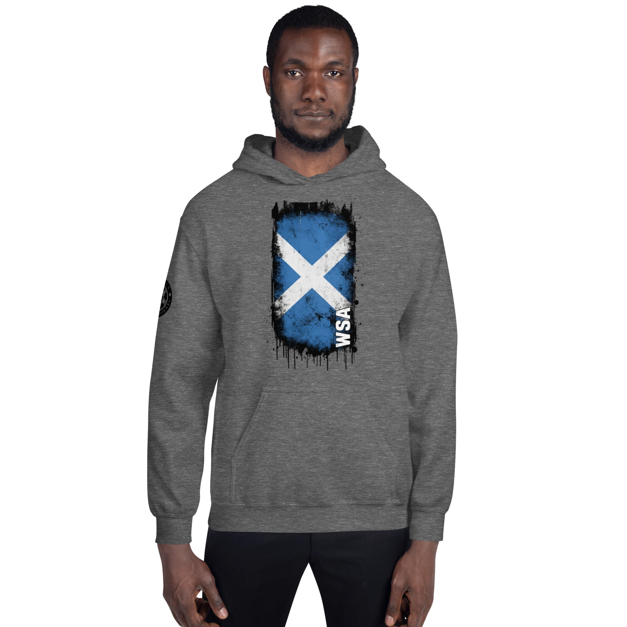Person wearing a gray hoodie with a Scottish flag design on a white background