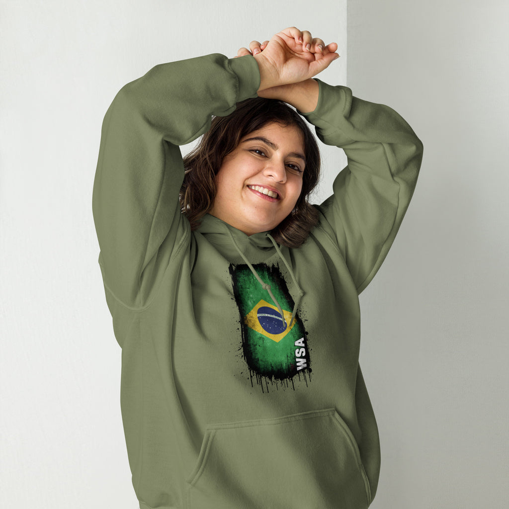 Person wearing a green hoodie with a Brazilian flag design on a plain background