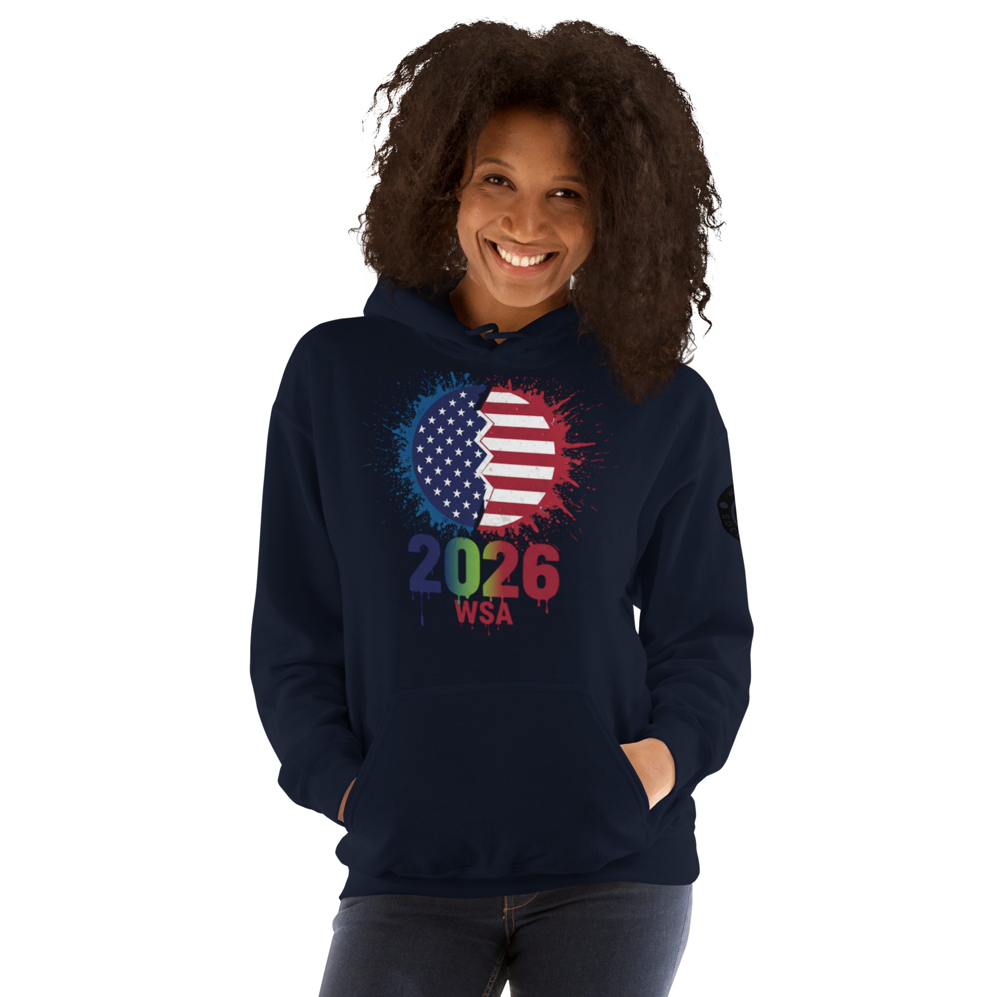 Person wearing a navy hoodie with a colorful design featuring the number 2026 and 'WSA' text on a white background