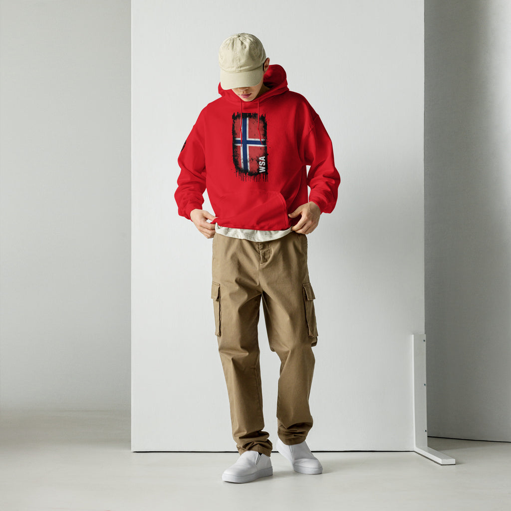 Person wearing a red hoodie with a logo, beige cap, and brown cargo pants against a white background