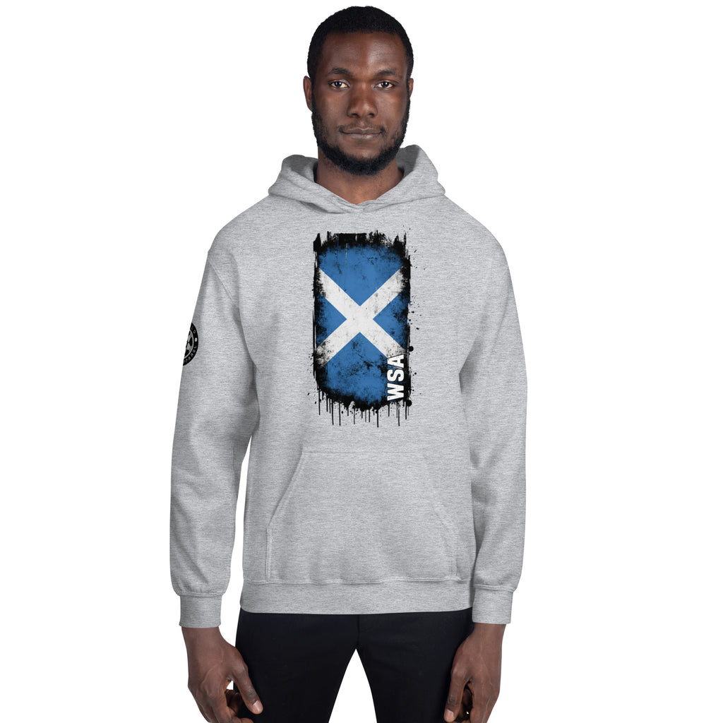Person wearing a gray hoodie with a Scottish flag design on a white background