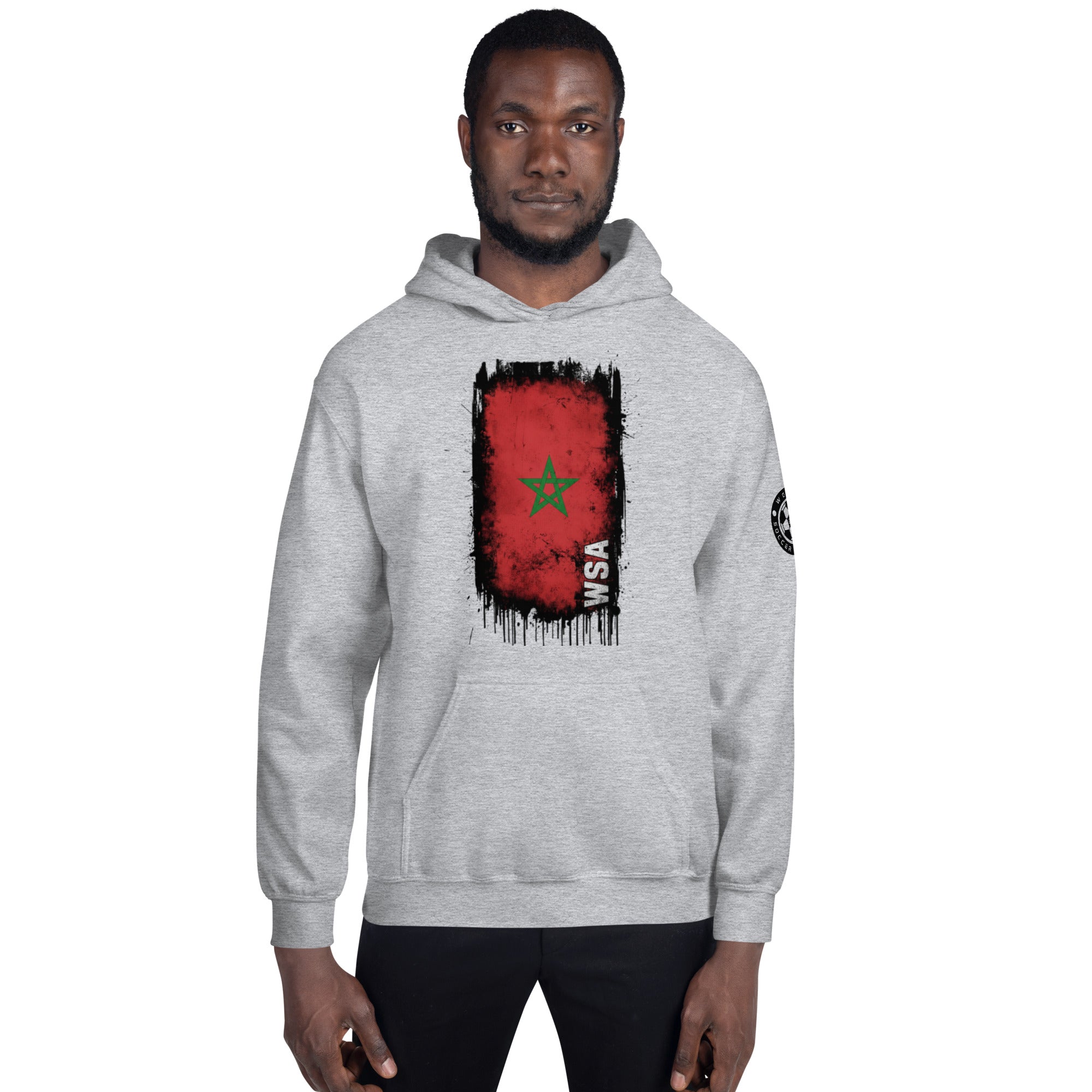 Person wearing a gray hoodie with a red and black graphic design on a white background