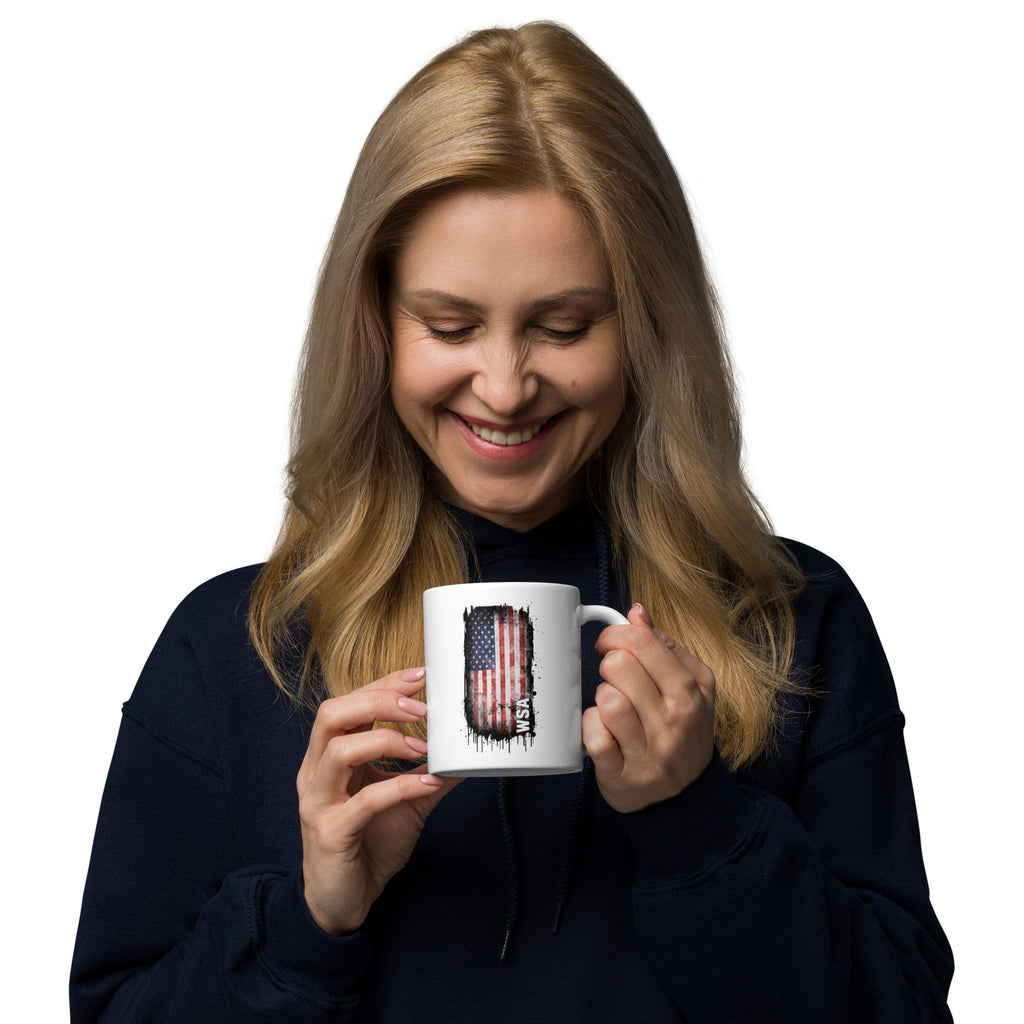 Woman holding a mug with an American flag design on a white background