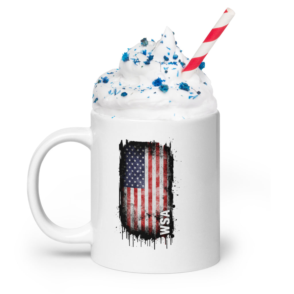 Mug with American flag design and whipped cream on a white background