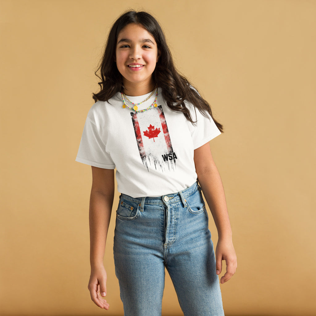 Young girl wearing a white t-shirt with a graphic design on a beige background